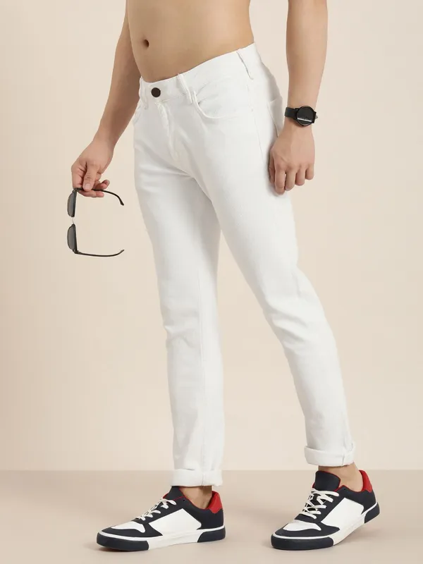 White_Cotton_Blend_Slim_Mid_Rise_Jeans_For_Men