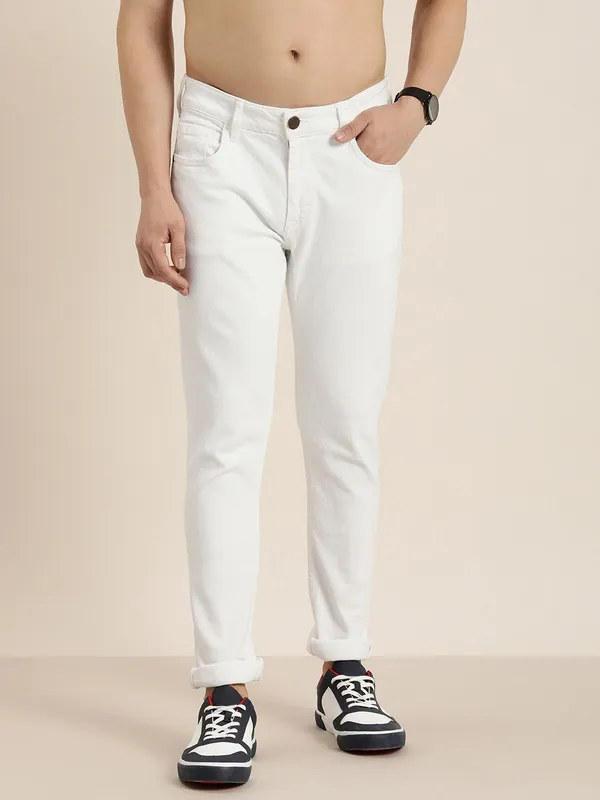 White_Cotton_Blend_Slim_Mid_Rise_Jeans_For_Men