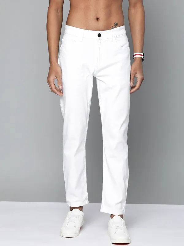 White_Cotton_Blend_Slim_Low_Rise_Jeans_For_Men