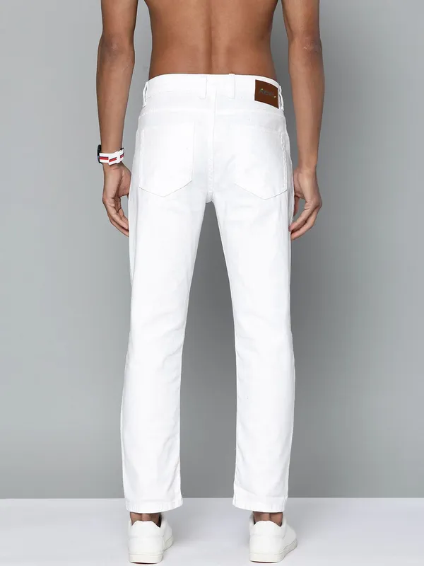 White_Cotton_Blend_Slim_Low_Rise_Jeans_For_Men