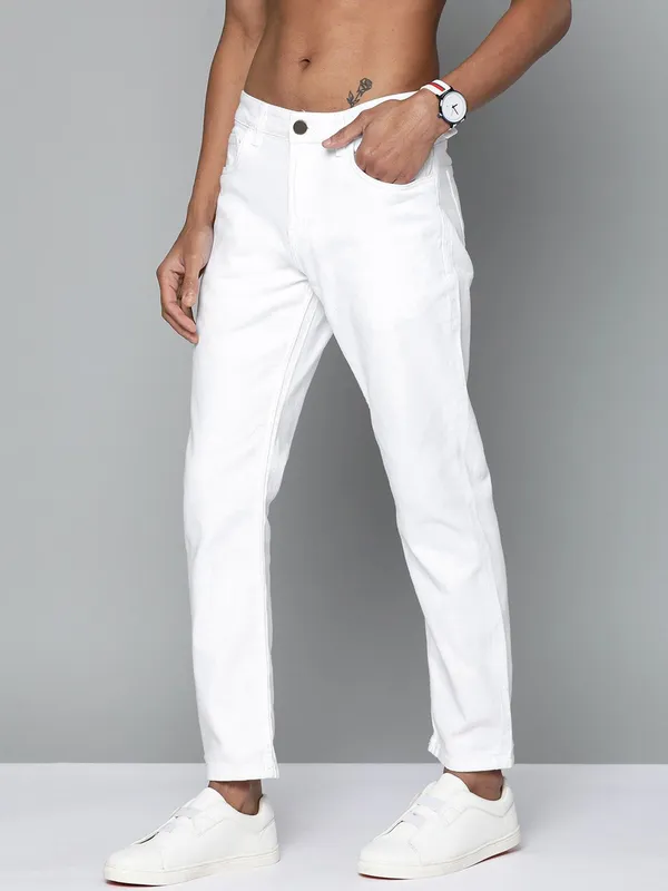 White_Cotton_Blend_Slim_Low_Rise_Jeans_For_Men