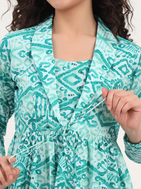Teal_Green_Floral_Cotton_Fabric_Lapel_Collar_Peplum_Top_For_Women