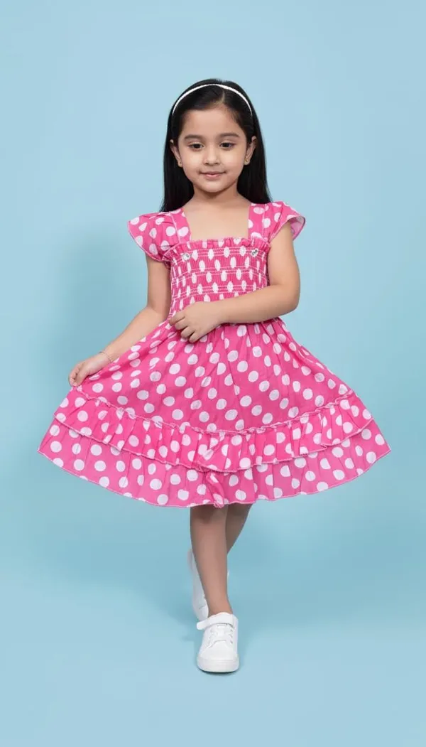 Girls_Pink_Polka_Dot_Smocked_Dress_With_Flutter_Sleeves
