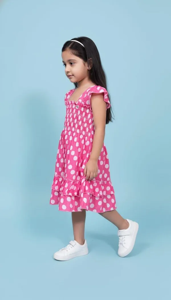 Girls_Pink_Polka_Dot_Smocked_Dress_With_Flutter_Sleeves