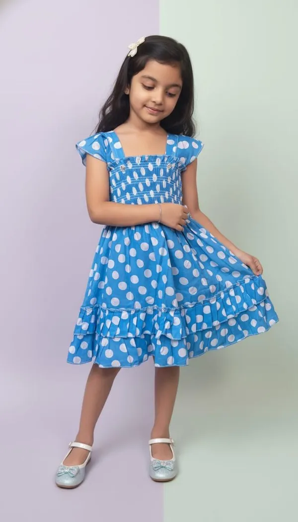 Girls_Blue_Polka_Dot_Smocked_Dress_With_Tiered_Ruffle_Hem