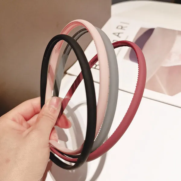 Pack_of_12_Pcs_Plain_Matt_Finish_Plastic_Hair_band_for_Kids_and_Women_-_Multicolour