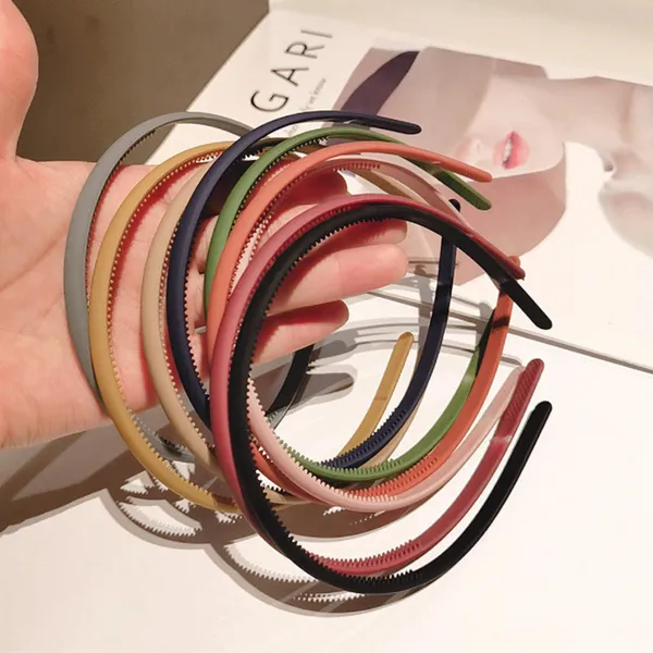 Pack_of_12_Pcs_Plain_Matt_Finish_Plastic_Hair_band_for_Kids_and_Women_-_Multicolour
