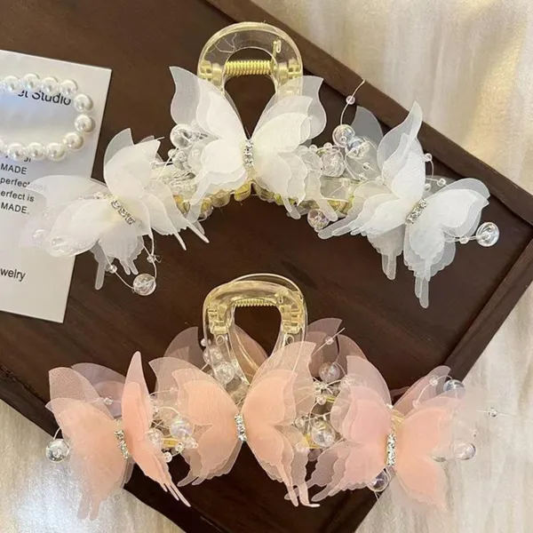 Pack_of_2_Pcs__Elegant_Floral_Butterfly_Plastic_Hair_Claw_Clip_for_Women_(_Peach_&_Cream)_–_Pearl_&_Crystal_Embellished_Designer_Clutcher_|_Bridal_Bun_Accessory_|_Wedding,_Party_&_Festive_Hair_Styling_Clip
