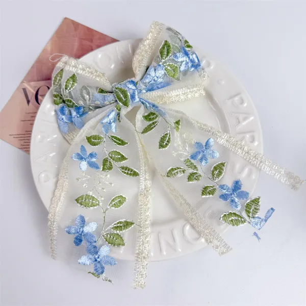 Soft_Lace_Fabric_Floral_Bow_Hair_Clip_|_Elegant_Embroidered_Flower_Design_|_Lightweight_&_Comfortable_|_Pack_of_2_(Blue_&_Red)
