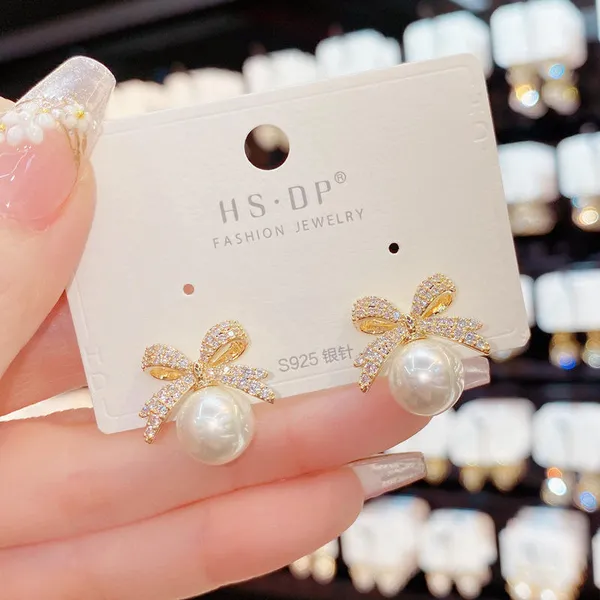 Creatitude_Elegant_Bow_Crystal_Stud_Earrings_with_Pearl_Drop_–_Gold_Finish_Party_&_Daily_Wear_Earrings_for_Women