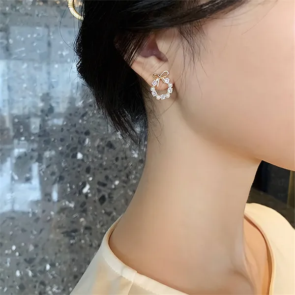Creatitude_Elegant_Bow_&_Pearl_Crystal_Wreath_Stud_Earrings_for_Women_–_Gold_Finish_Party_&_Daily_Wear