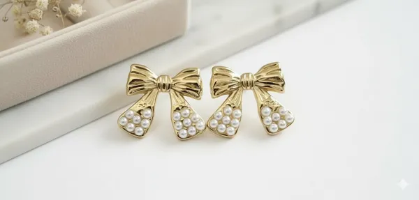 Gold_Pearl_Bow_Earrings_|_Elegant_Luxe_Statement_Design_For_Women