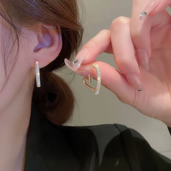 Gold_Curve_Spark_Earrings_|_Sculpted_Crystal-Embellished_Hoops_For_Women