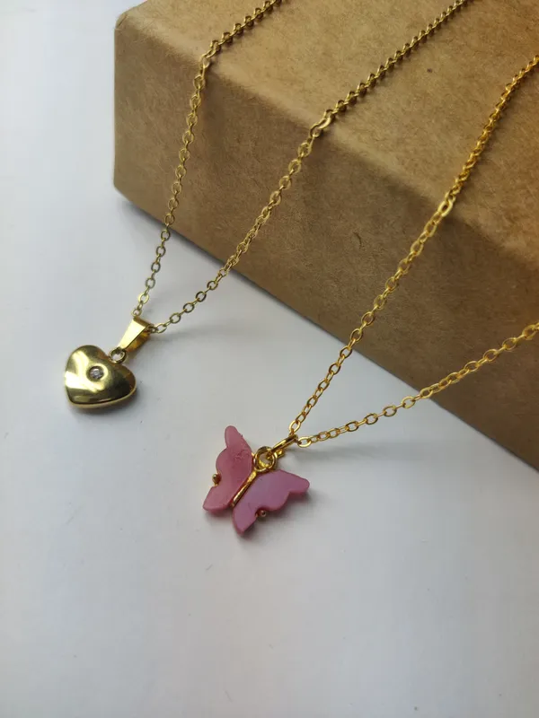 Gold_Brass_Premium_Heart_Centre_Round_&_Acralyc_Butterfly_Pendant_Combo_For_Women_(Pack_Of_2)