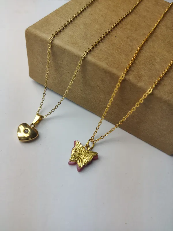 Gold_Brass_Premium_Heart_Centre_Round_&_Acralyc_Butterfly_Pendant_Combo_For_Women_(Pack_Of_2)