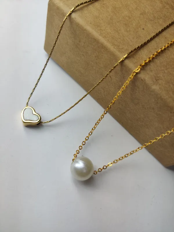 Gold_Brass_Premium_Pearl_Heart_&_Round_Ball_Pendant_Combo_For_Women_(Pack_Of_2)