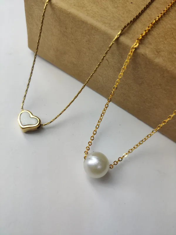 Gold_Brass_Premium_Pearl_Heart_&_Round_Ball_Pendant_Combo_For_Women_(Pack_Of_2)