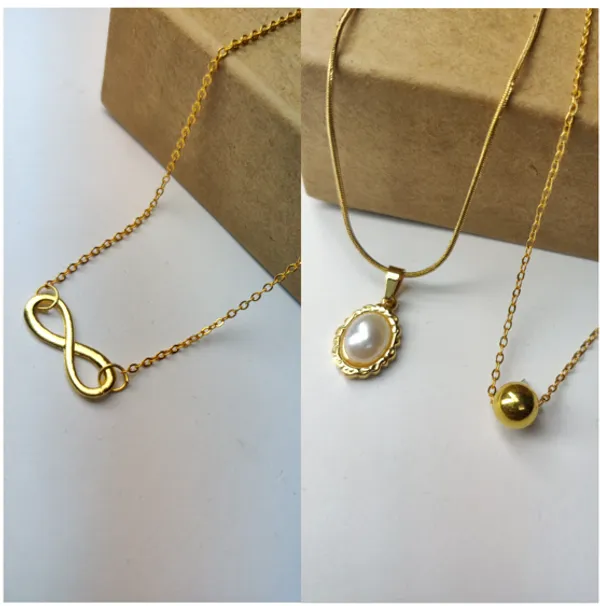 Gold_Brass_Premium_Infinity_And_Oval_Pearl_Drop_And_Ball_Pendant_Combo_For_Women_(Pack_Of_2)