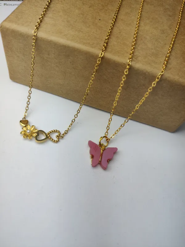 Gold_Brass_Premium_Flower_Heart_Channel_&_Acralyc_Butterfly_Pendant_Combo_For_Women_(Pack_Of_2)