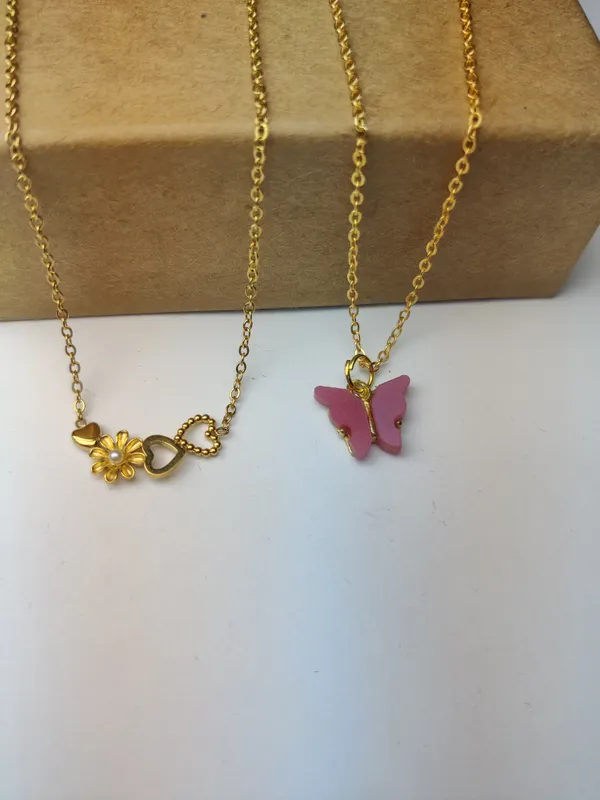 Gold_Brass_Premium_Flower_Heart_Channel_&_Acralyc_Butterfly_Pendant_Combo_For_Women_(Pack_Of_2)