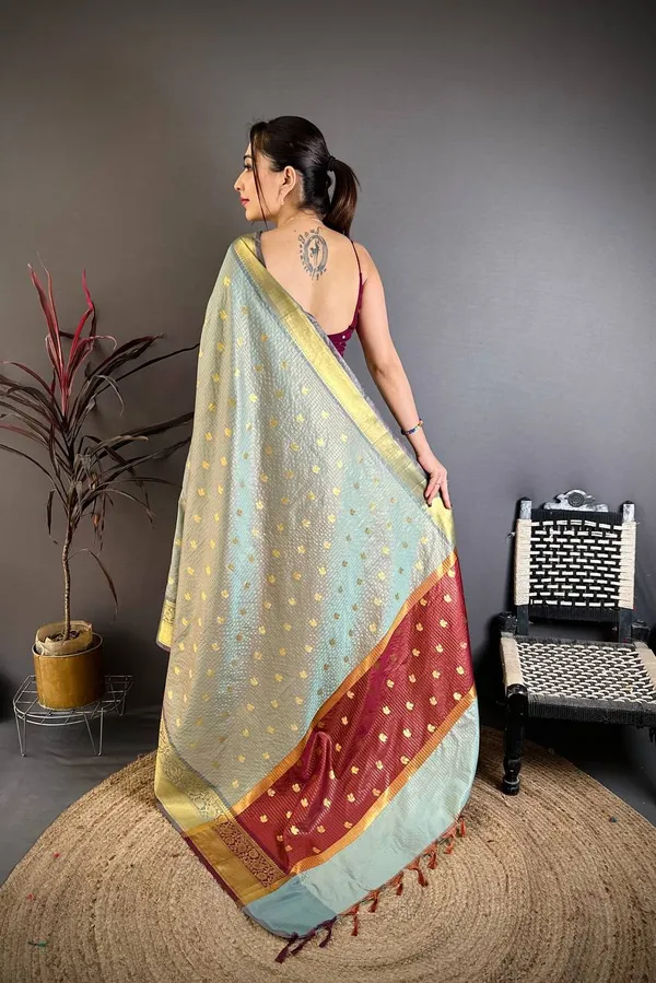 Elegant_Pastel_Pista_Green_Banarasi_Tissue_Silk_Saree_with_Zari_Butti_&_Rich_Border