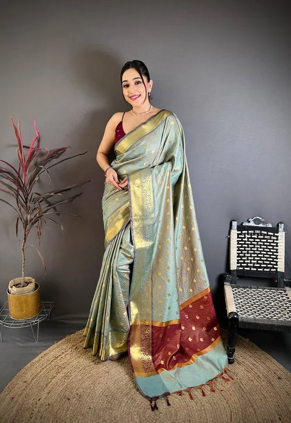 Elegant_Pastel_Pista_Green_Banarasi_Tissue_Silk_Saree_with_Zari_Butti_&_Rich_Border