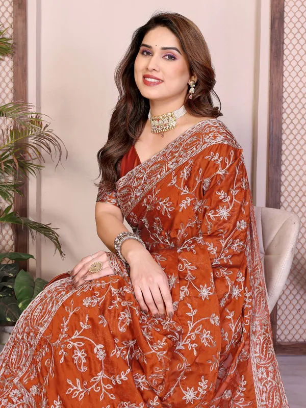 Party_Wear_Rangoli_Silk_Saree_in_Rust_Maroon_with_Elegant_Embroidery_Cutwork_Borde