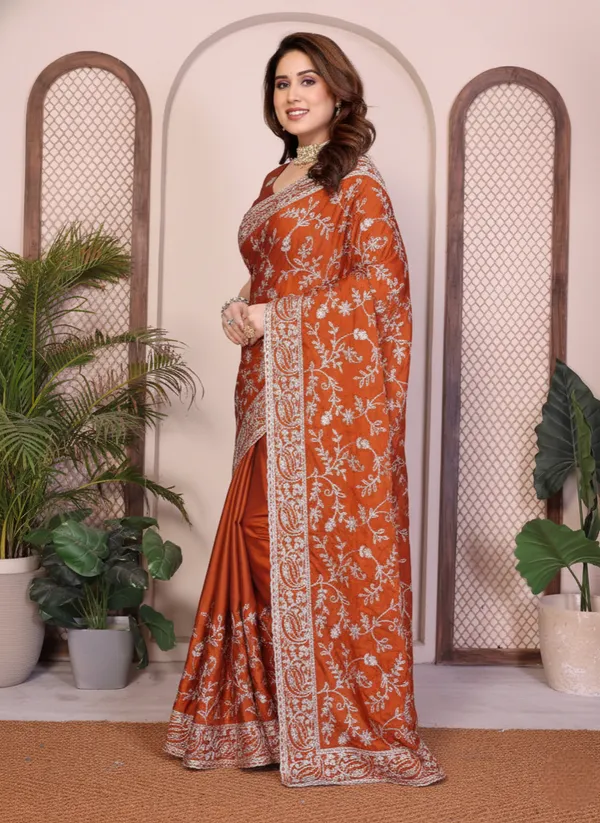 Party_Wear_Rangoli_Silk_Saree_in_Rust_Maroon_with_Elegant_Embroidery_Cutwork_Borde