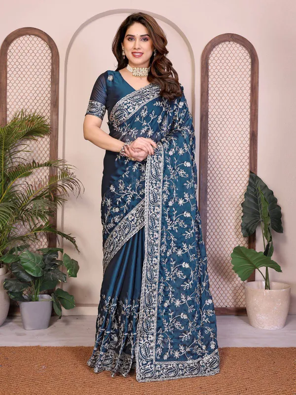 Party_Wear_Rangoli_Silk_Saree_in_Teal_Blue_with_Rich_Embroidery_Cutwork_Border