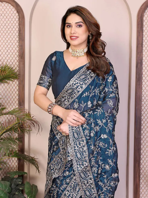 Party_Wear_Rangoli_Silk_Saree_in_Teal_Blue_with_Rich_Embroidery_Cutwork_Border