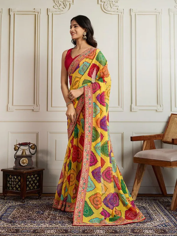 Sunshine_Yellow_Party_Wear_Soft_Georgette_Bandhej_Saree_with_Multi_Embroidery_Lace_Border