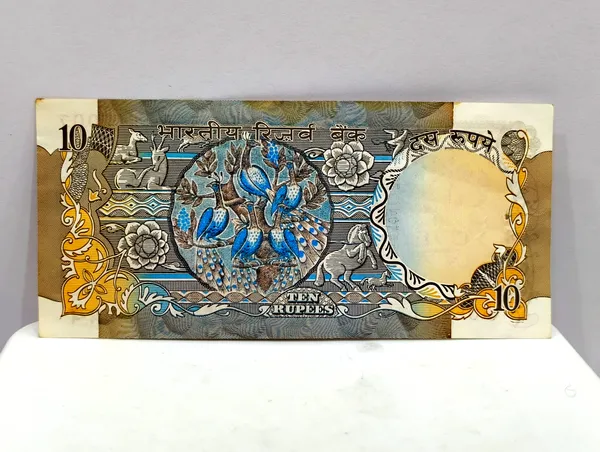 Blue_10_Rupees_(Random_Sign)_5_Seated_Peacock_-_India_old_Note