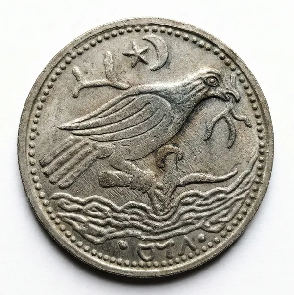 Ancient_Crow_Seated_Old_And_Rare_Coin
