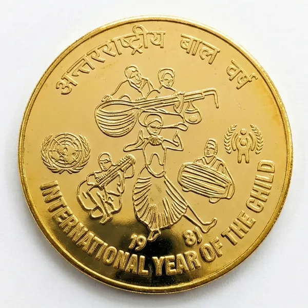 Gold_Plated_100_Rupees_1981_International_Year_Of_The_Child_India_Fantasy_Coin