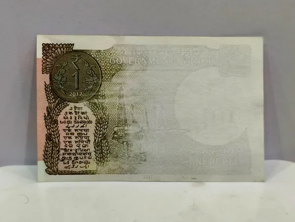 Rare_1_Rupee_(Random_Year)_Half_Print_Error,_India_old_Pink_Note