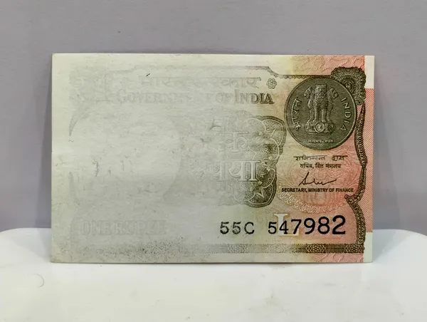 Rare_1_Rupee_(Random_Year)_Half_Print_Error,_India_old_Pink_Note