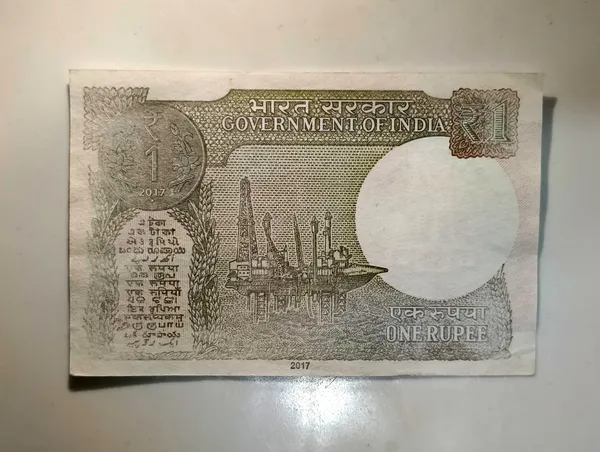 Rare_1_Rupee_(Random_Year)_1_Side_Plain_No_Print_Error,_India_old_Pink_Note