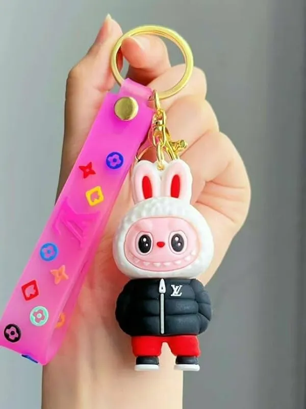 Cute_Labubu_Keychain_With_Pink_Strap,_Gold_Ring,_Cartoon_Character_Charm,_Fashion_Accessory