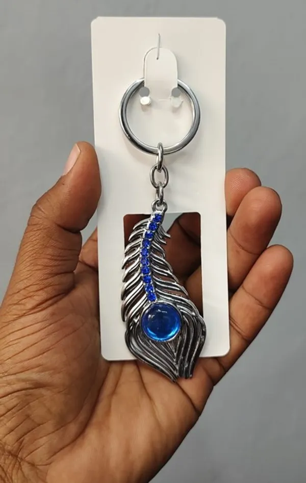 Omg_Movie_Peacock_Keychain,_Silver-Toned_Metal_With_Blue_Crystal_Accents