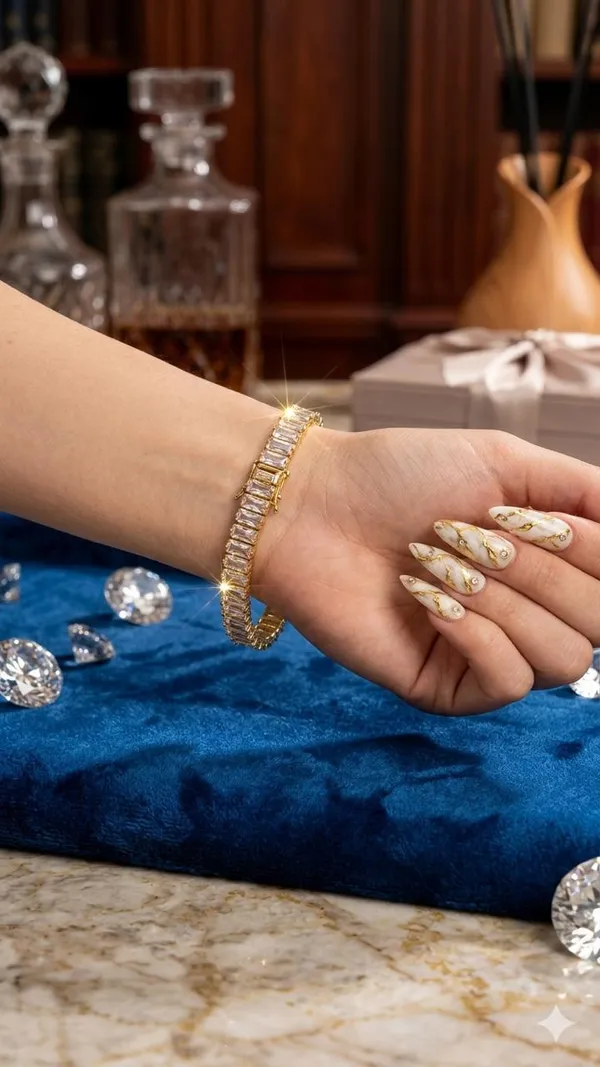 Shubh_aura_presents_A_glamorous_gold_plated_bracelet_with_transparant_Baguette_cut_stones,_crafted_in_a_refined_tennis_style,_Its_Sparkle_and_polished_finish_add_timelss_beauty