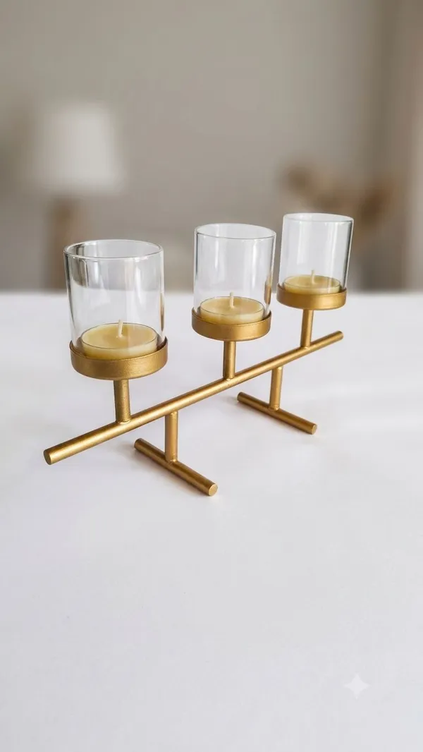 Shubh_Aura_Pack_of_1_Premium_Gold_finish_metal_candle_holder,_It_has_3_borosilicate_glass_to_proetct_fire,_its_good_for_Home_d�cor_dinining_table,_candle_decoration_for_festivals,_size_length_8.5cm_&_height_15.5cm