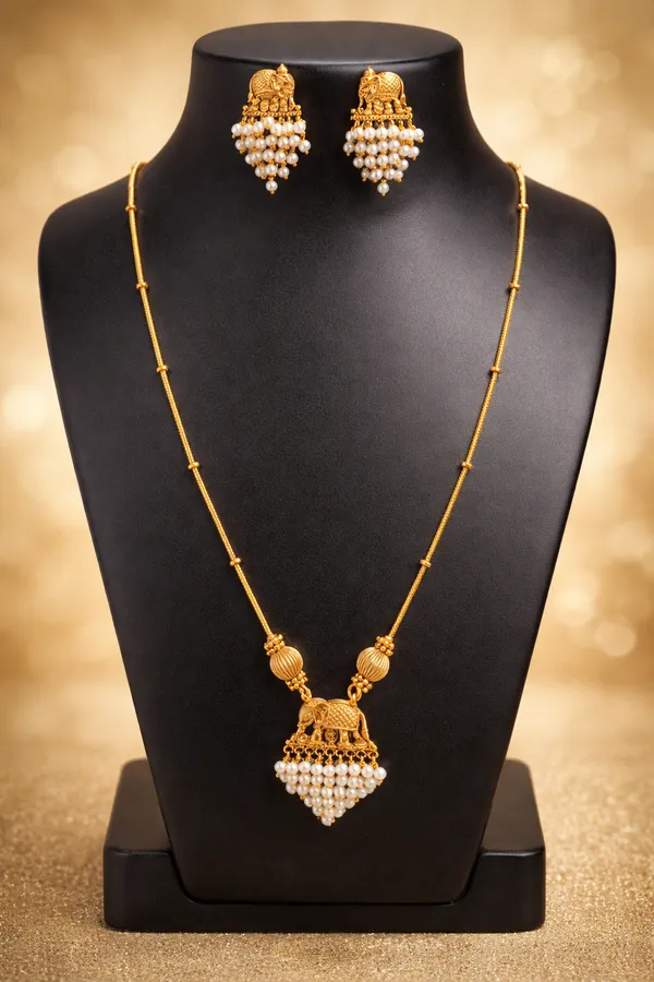 Gold-Tone_Temple_Necklace_Set_with_Elephant_Motif_&_Pearl_Drops