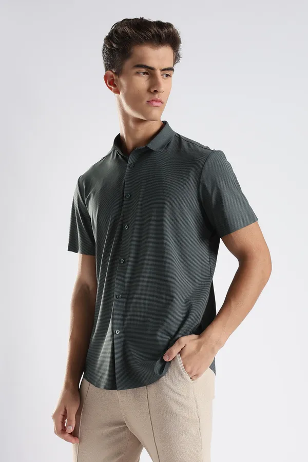 Dark_Green_Nylon_Spandex_Stitchless_Shirt_For_Men