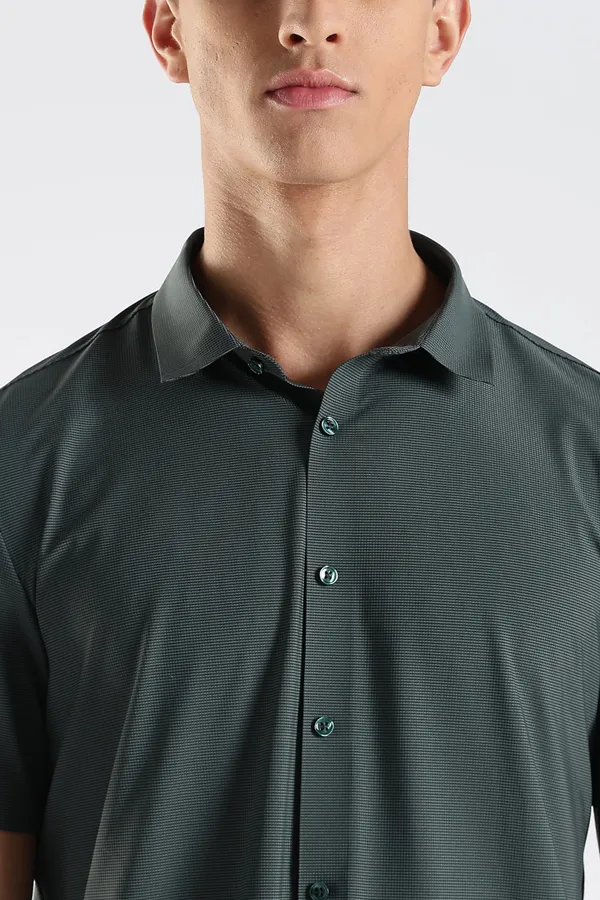 Dark_Green_Nylon_Spandex_Stitchless_Shirt_For_Men