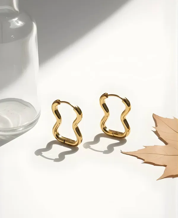 Golden_Stainless_Steel_Anti_Tarnish_Wave_Glow_Hoops_For_Women