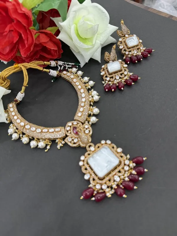 Royal_White_Kundan_Necklace_Set_with_Maroon_Drop_Earrings_For_Women