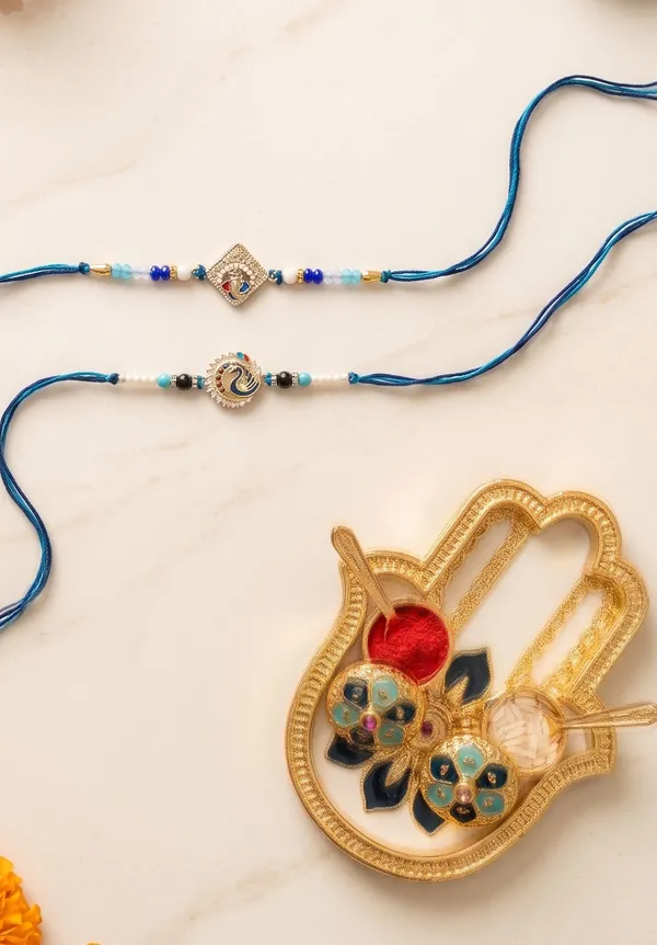 German_Silver__Ganesh_&_Peacock_Rakhi_Pair_for_Brothers_|_Designer_Traditional_Rakhi_Set