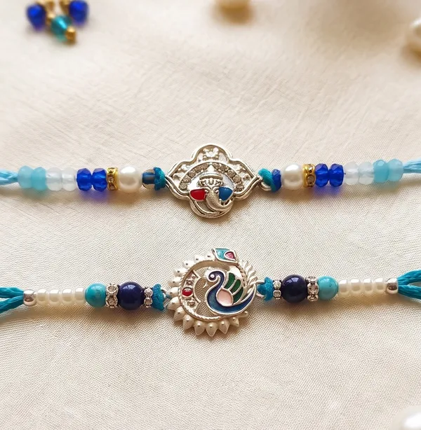 German_Silver__Ganesh_&_Peacock_Rakhi_Pair_for_Brothers_|_Designer_Traditional_Rakhi_Set