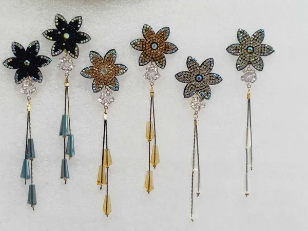 Dazzle_and_delight_with_our_radiant_star_earrings_Cubic_Zirconia_Alloy_Drops_&_Danglers