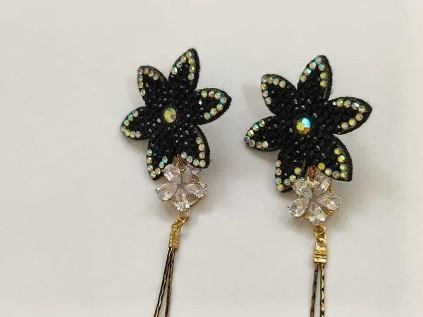Dazzle_and_delight_with_our_radiant_star_earrings_Cubic_Zirconia_Alloy_Drops_&_Danglers
